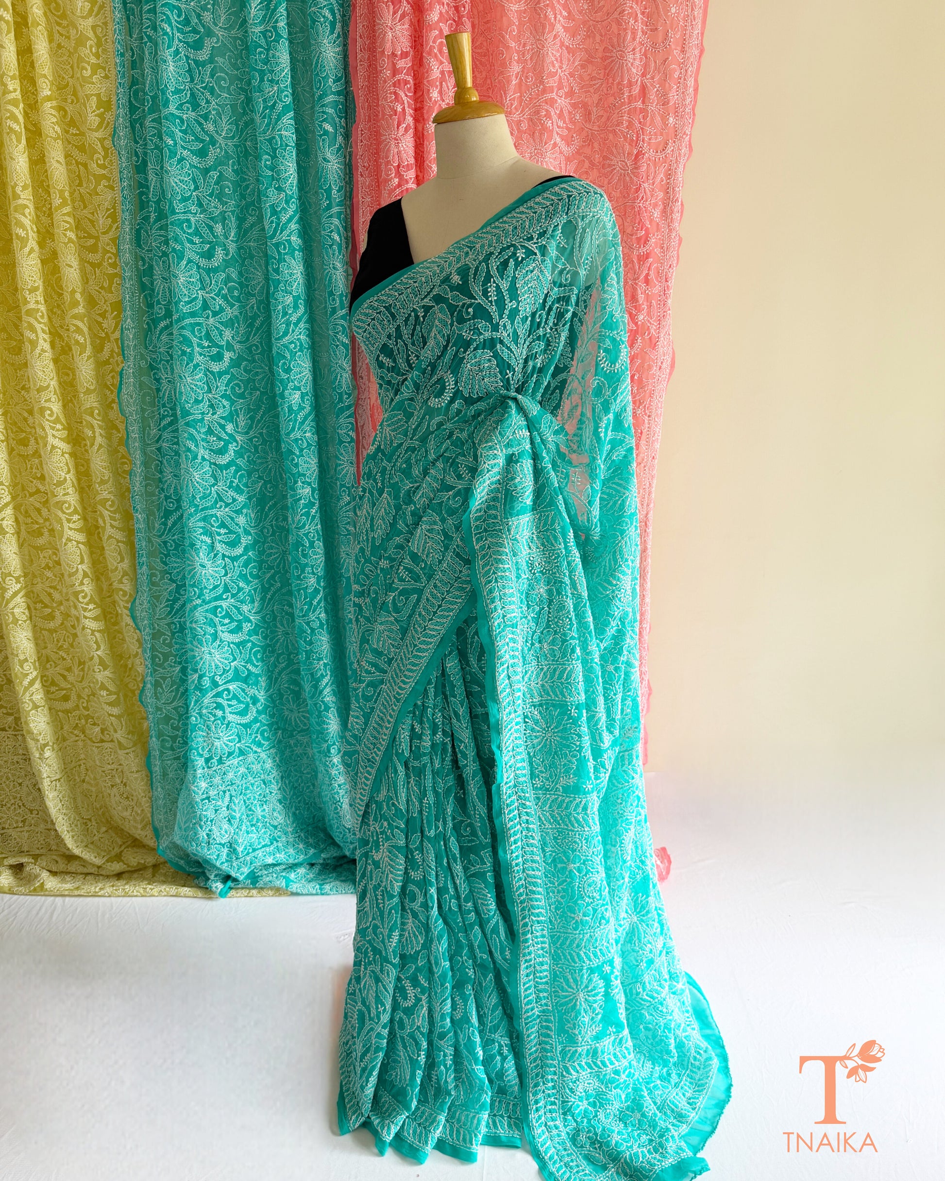 Handcrafted Chikankari saree with intricate Lucknowi embroidery and elegant drape.