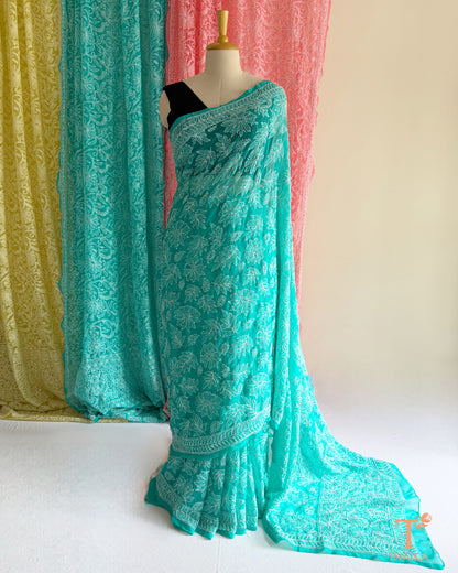Handcrafted full jaal Lucknowi Chikankari saree for festive and ethnic wear.