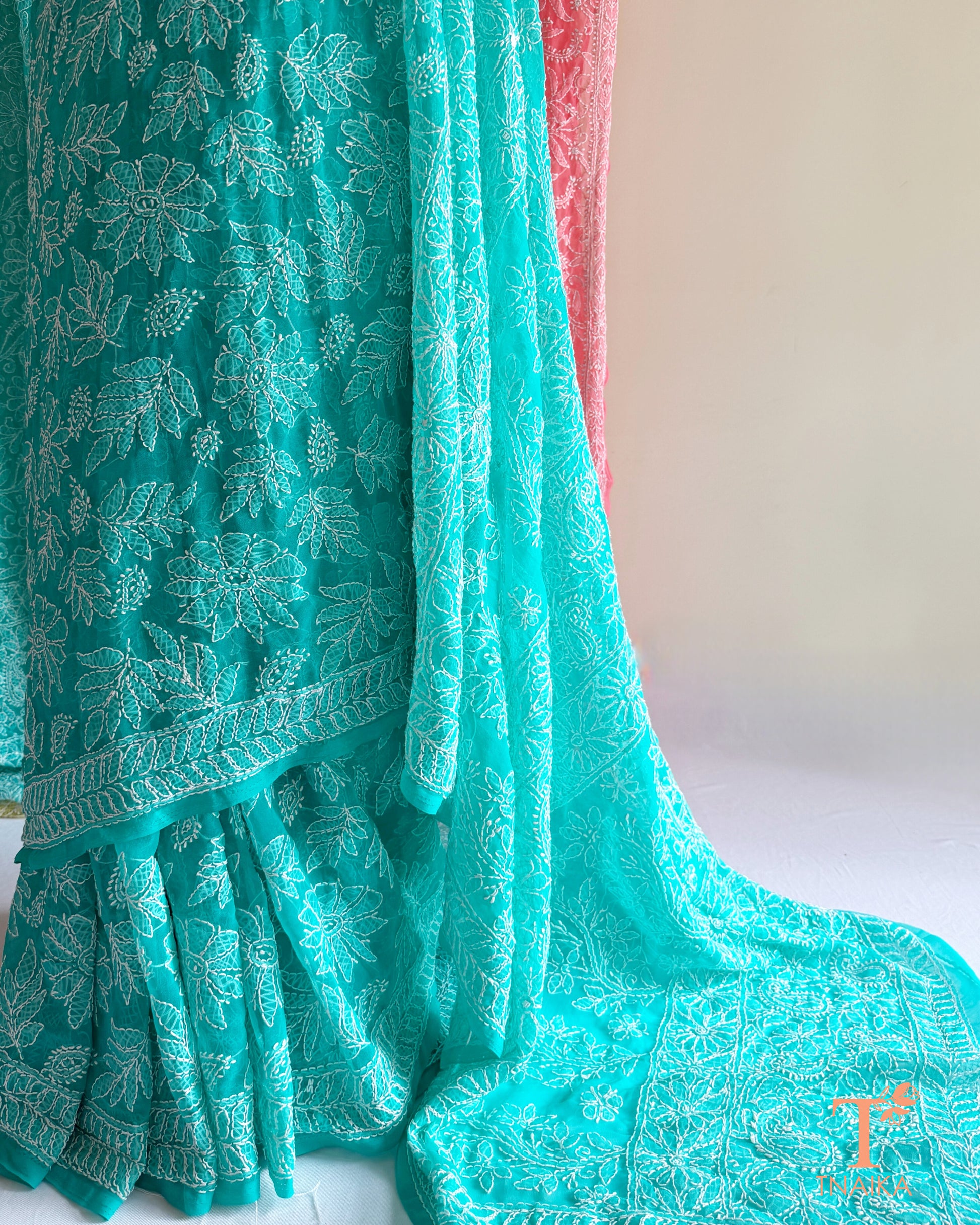 Lightweight full jaal Chikankari saree with intricate floral embroidery.
