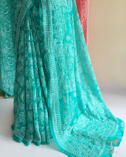 Full jaal Chikankari saree with intricate Lucknowi embroidery on soft fabric.
