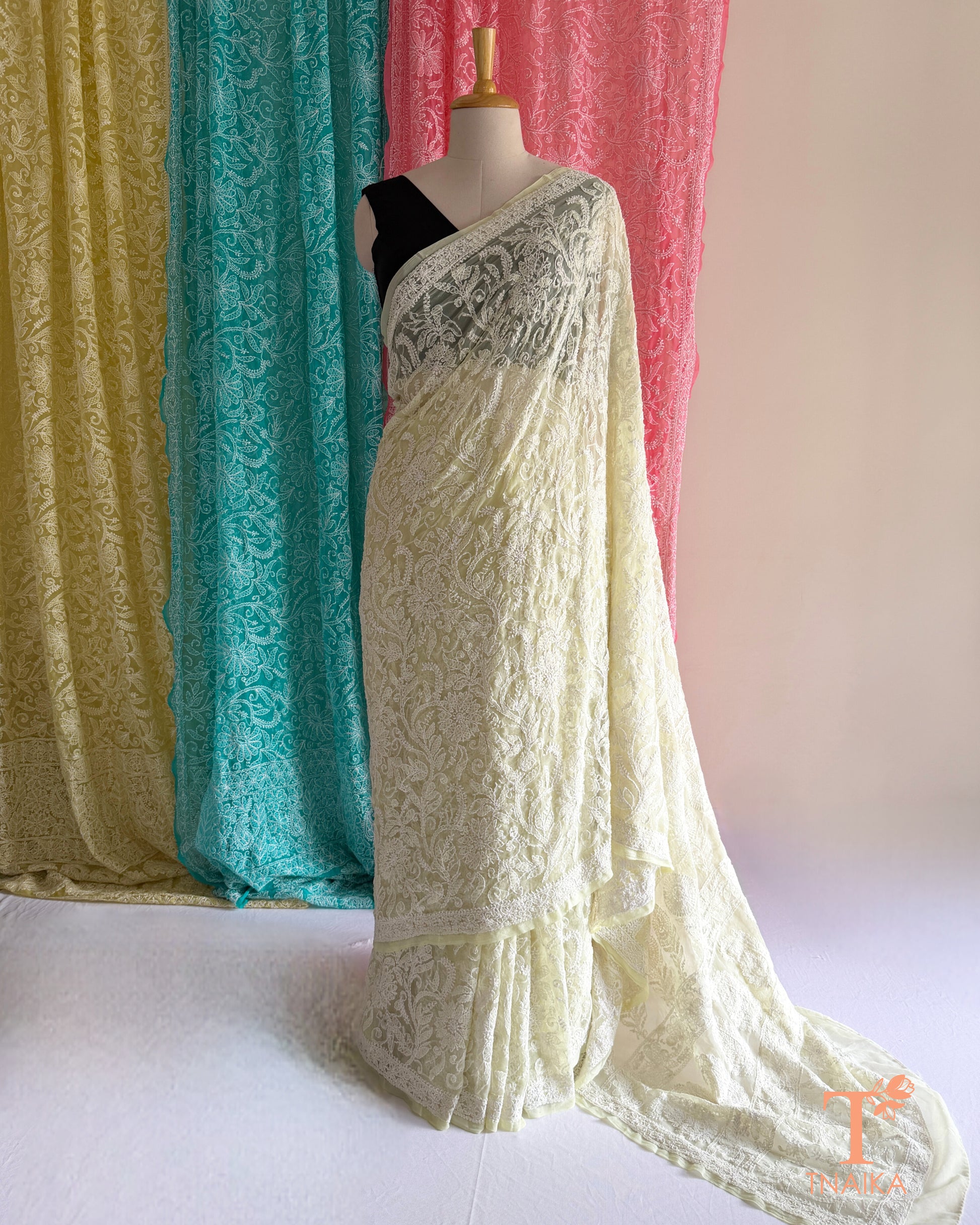 Full jaal Chikankari saree with intricate Lucknowi embroidery on soft fabric.