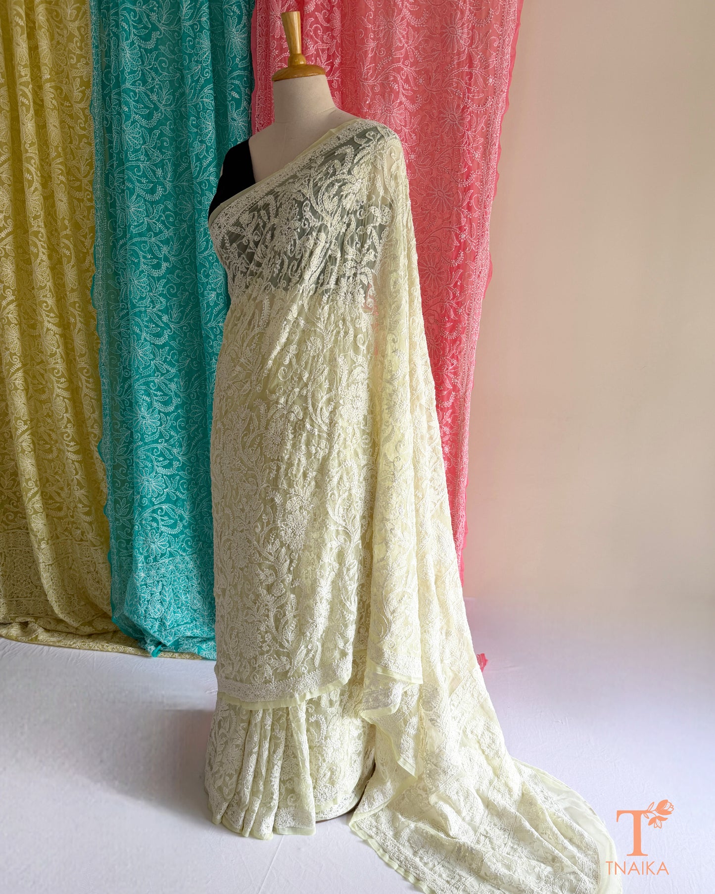Premium Chikankari full jaal saree featuring dense traditional embroidery.