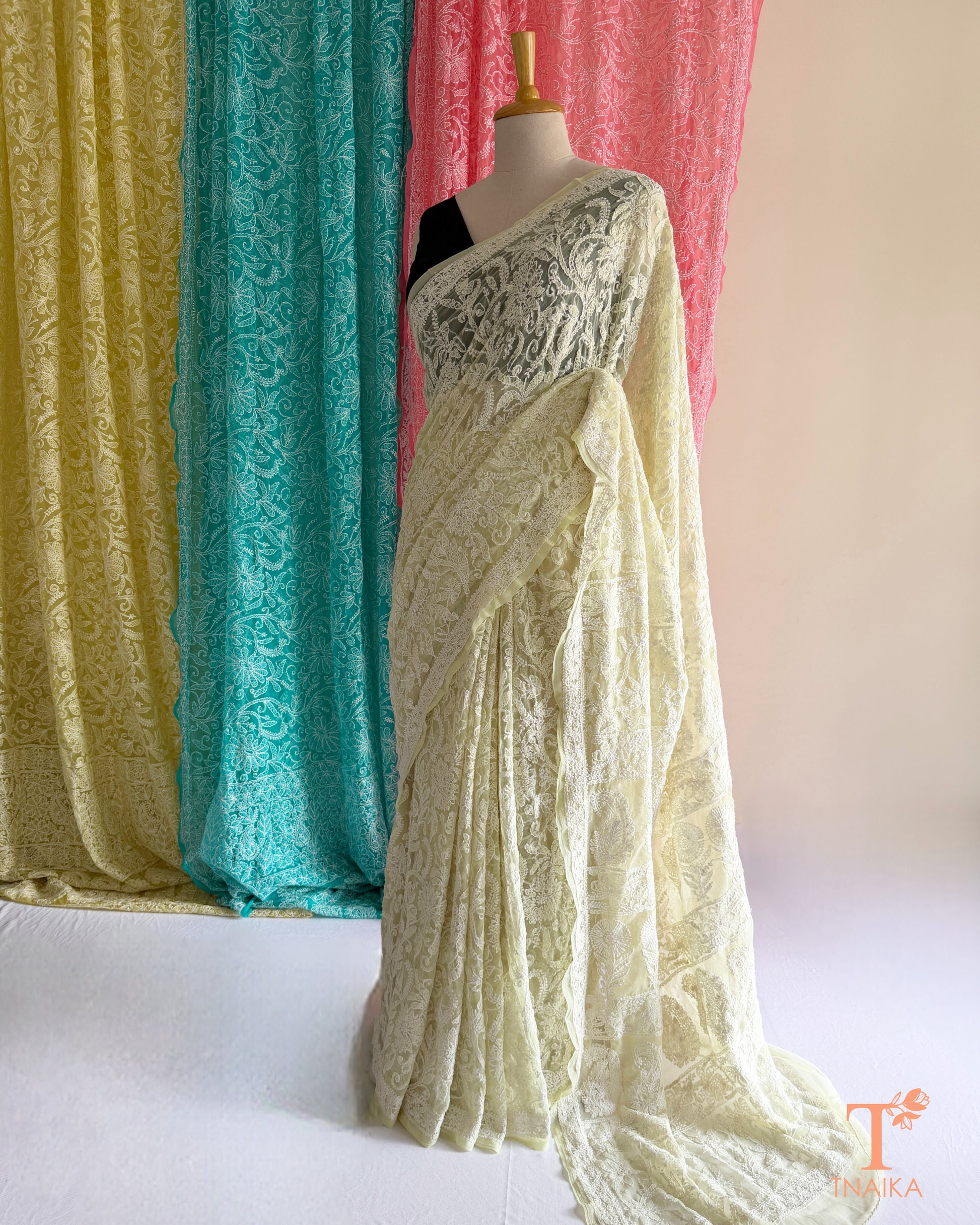 Lightweight full jaal Chikankari saree with intricate floral embroidery.