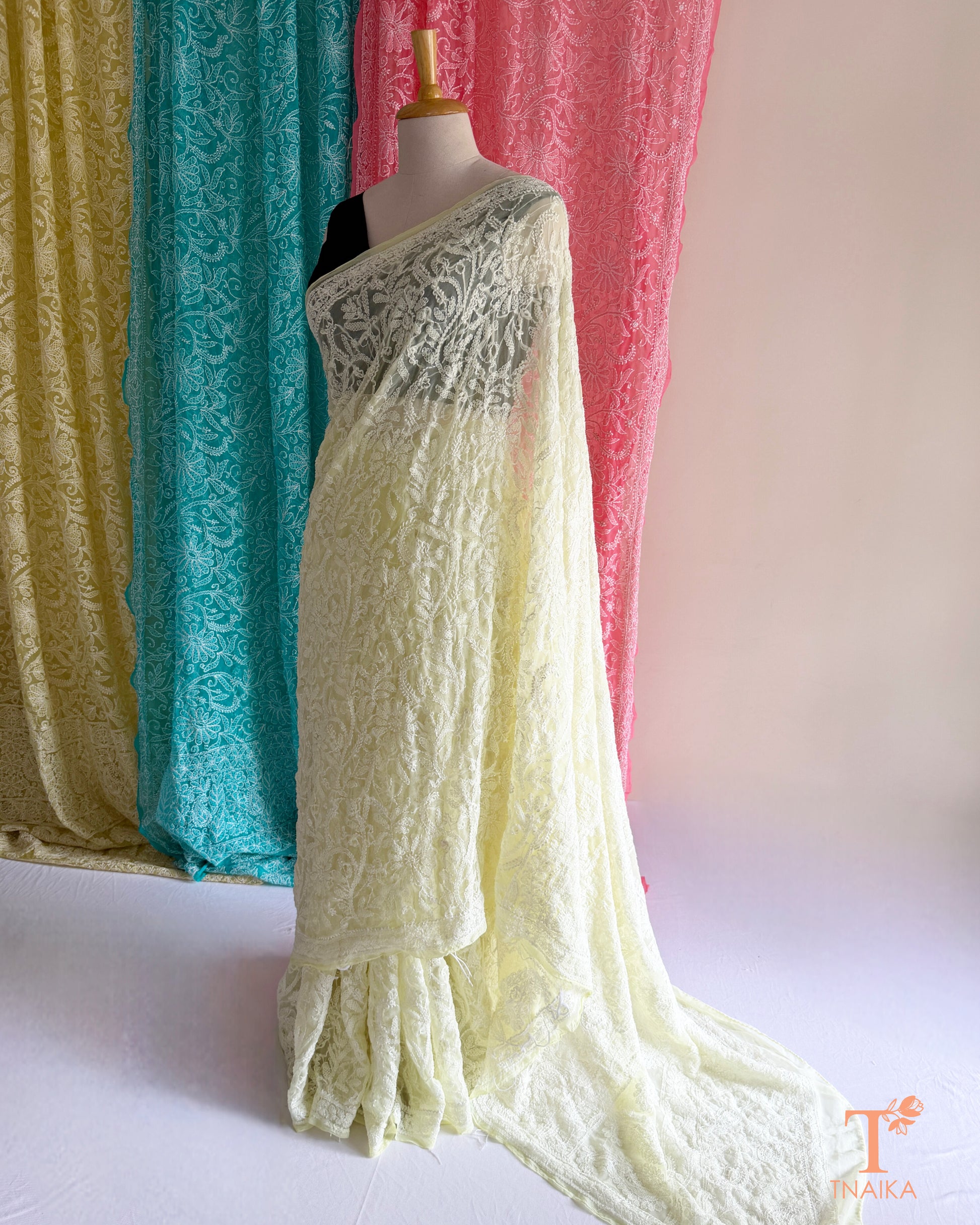 Premium Chikankari full jaal saree featuring dense traditional embroidery.
