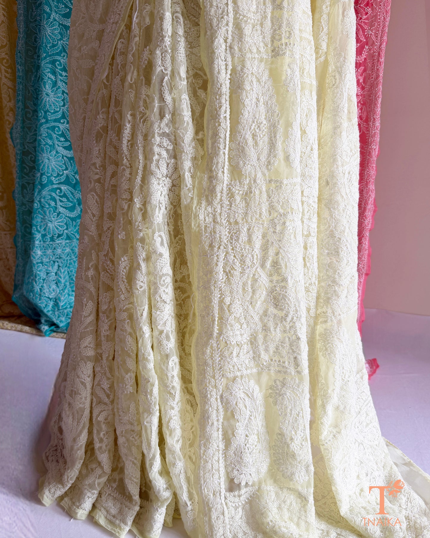 Full jaal Chikankari saree with intricate Lucknowi embroidery on soft fabric.