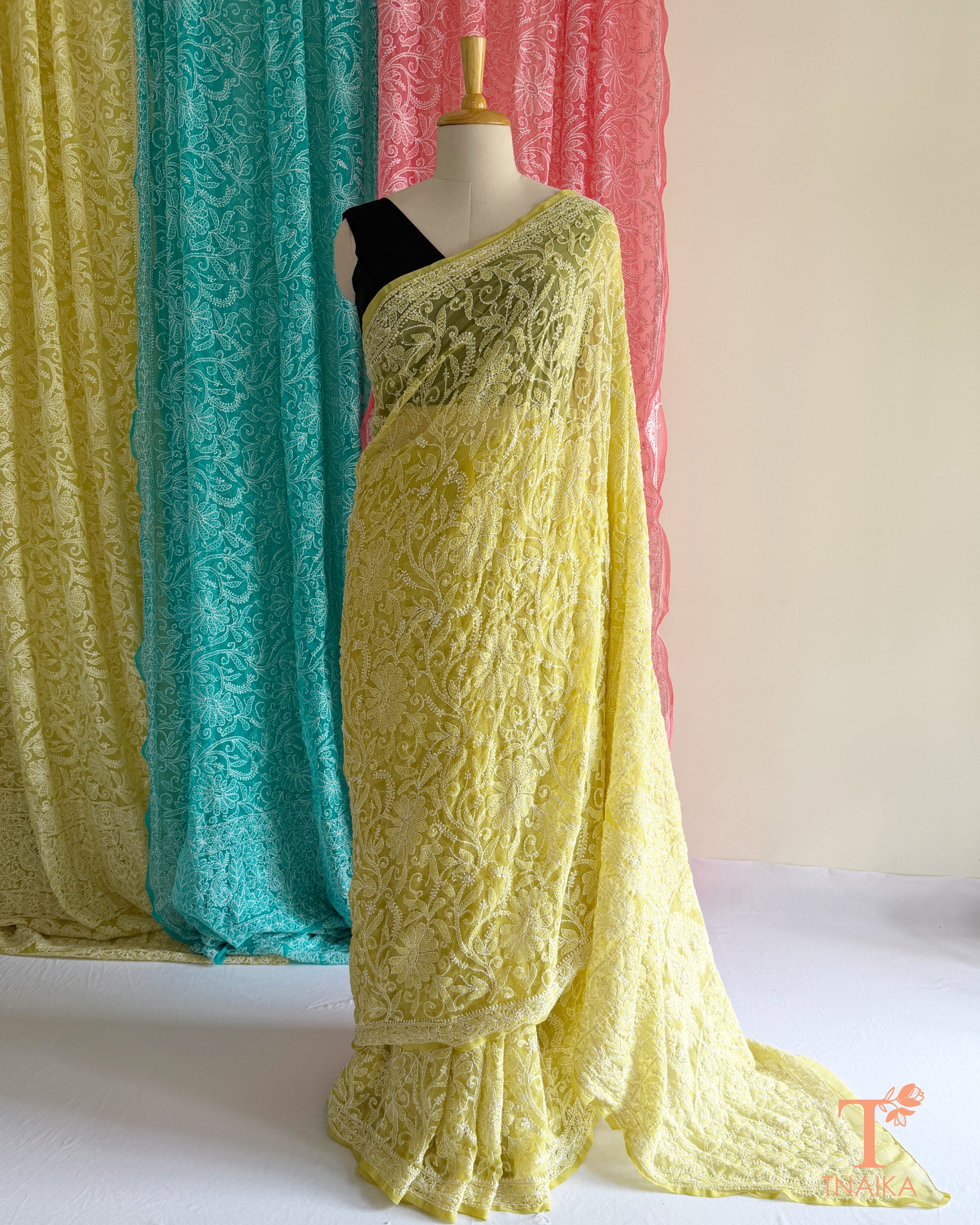 Full jaal Chikankari saree with intricate Lucknowi embroidery on soft fabric.