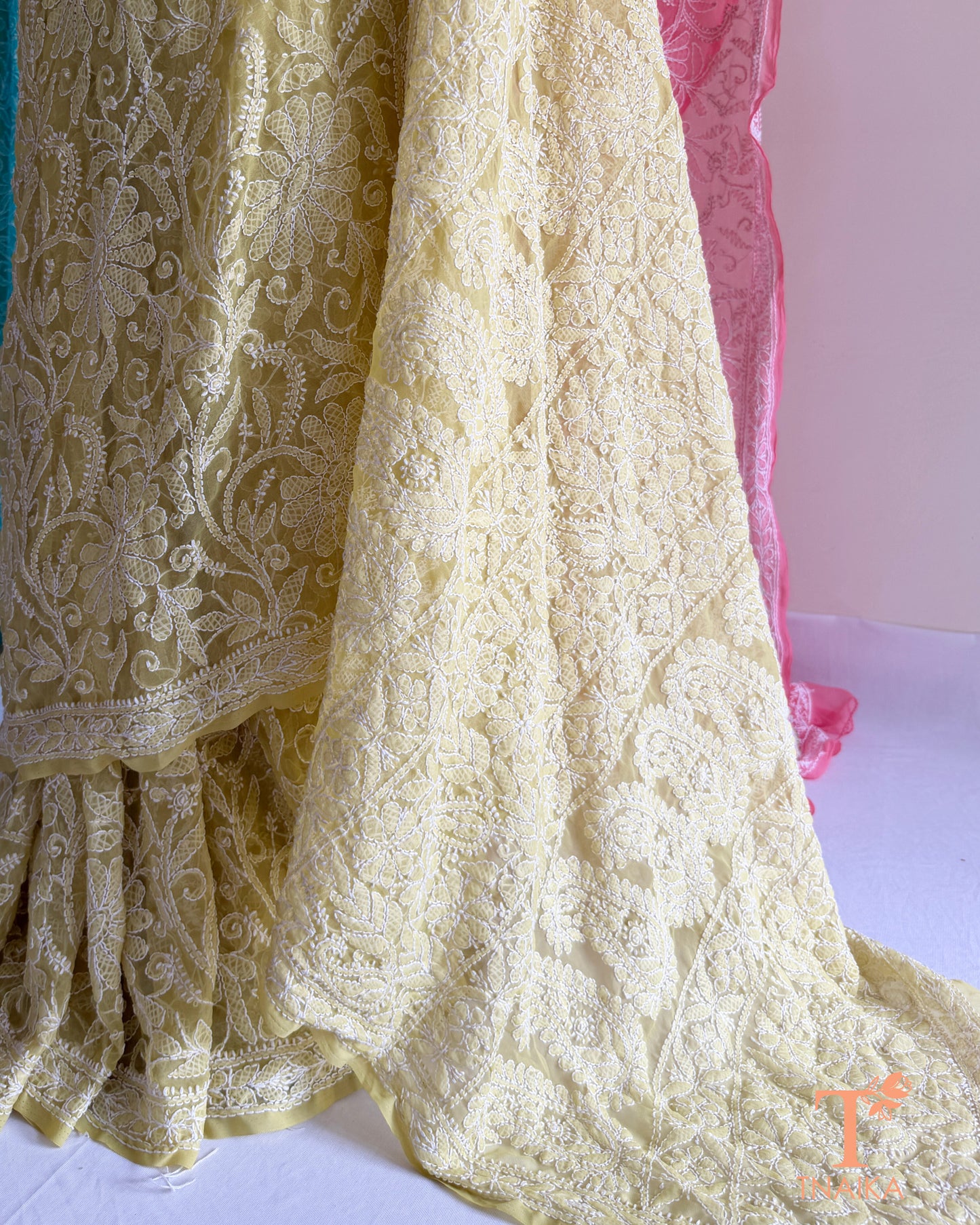 Premium Chikankari full jaal saree featuring dense traditional embroidery.