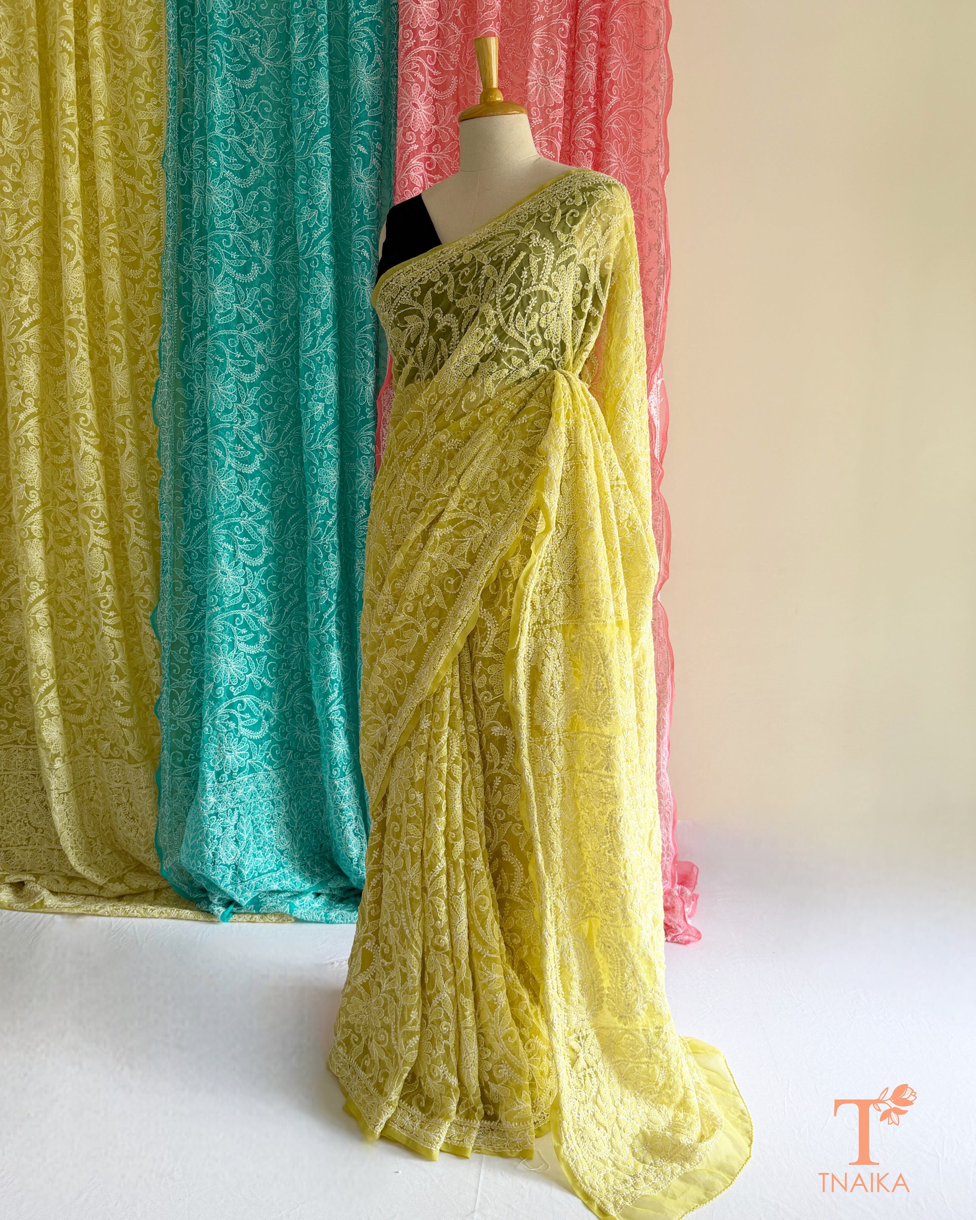 Lightweight full jaal Chikankari saree with intricate floral embroidery.