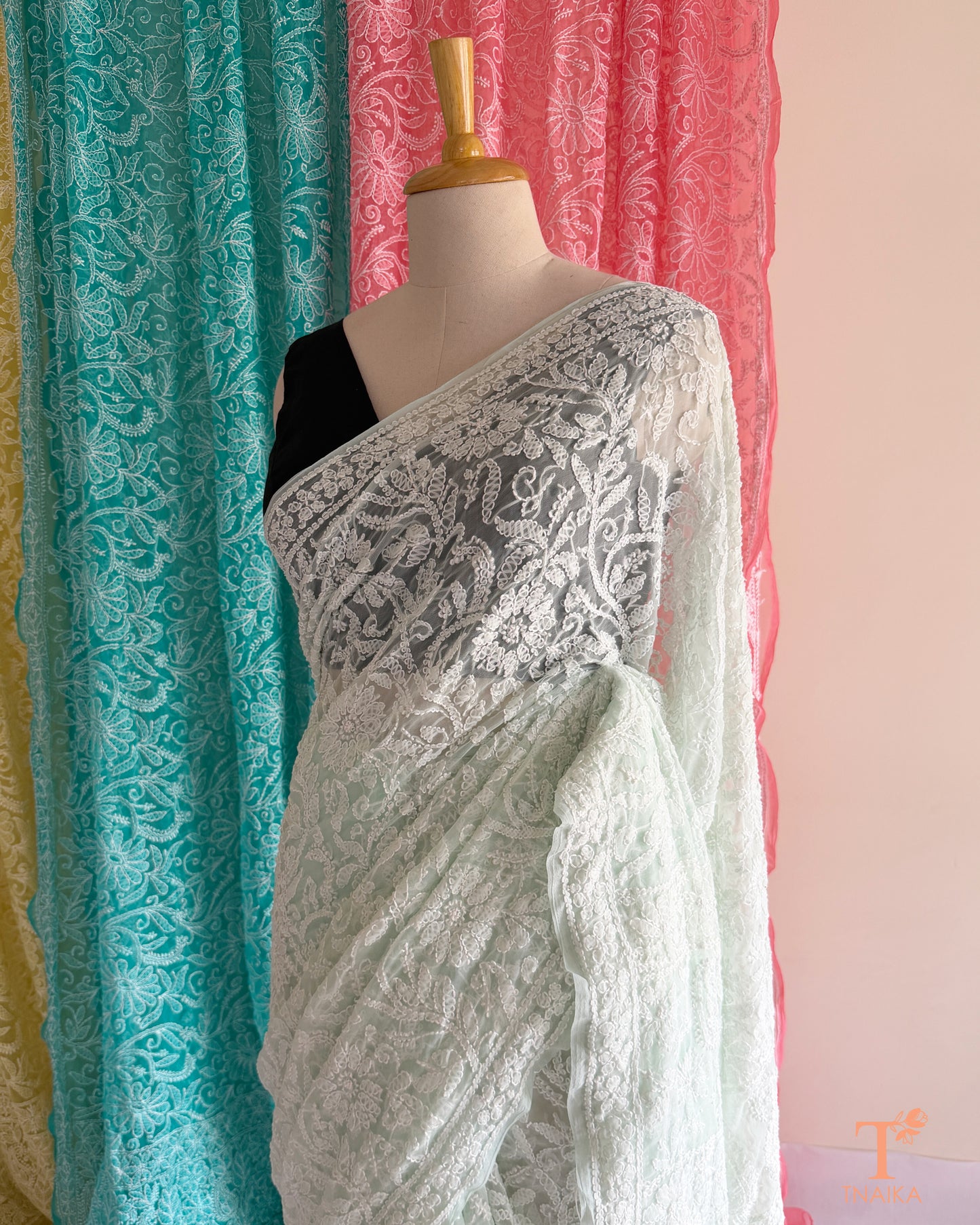 Soft Chikankari embroidered saree with timeless handcrafted detailing.