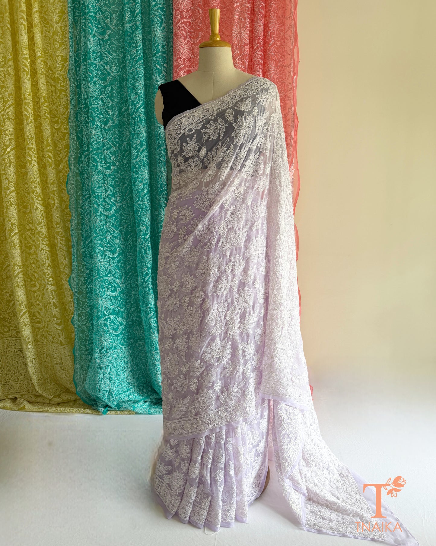 Premium Chikankari saree showcasing traditional embroidery and refined craftsmanship.