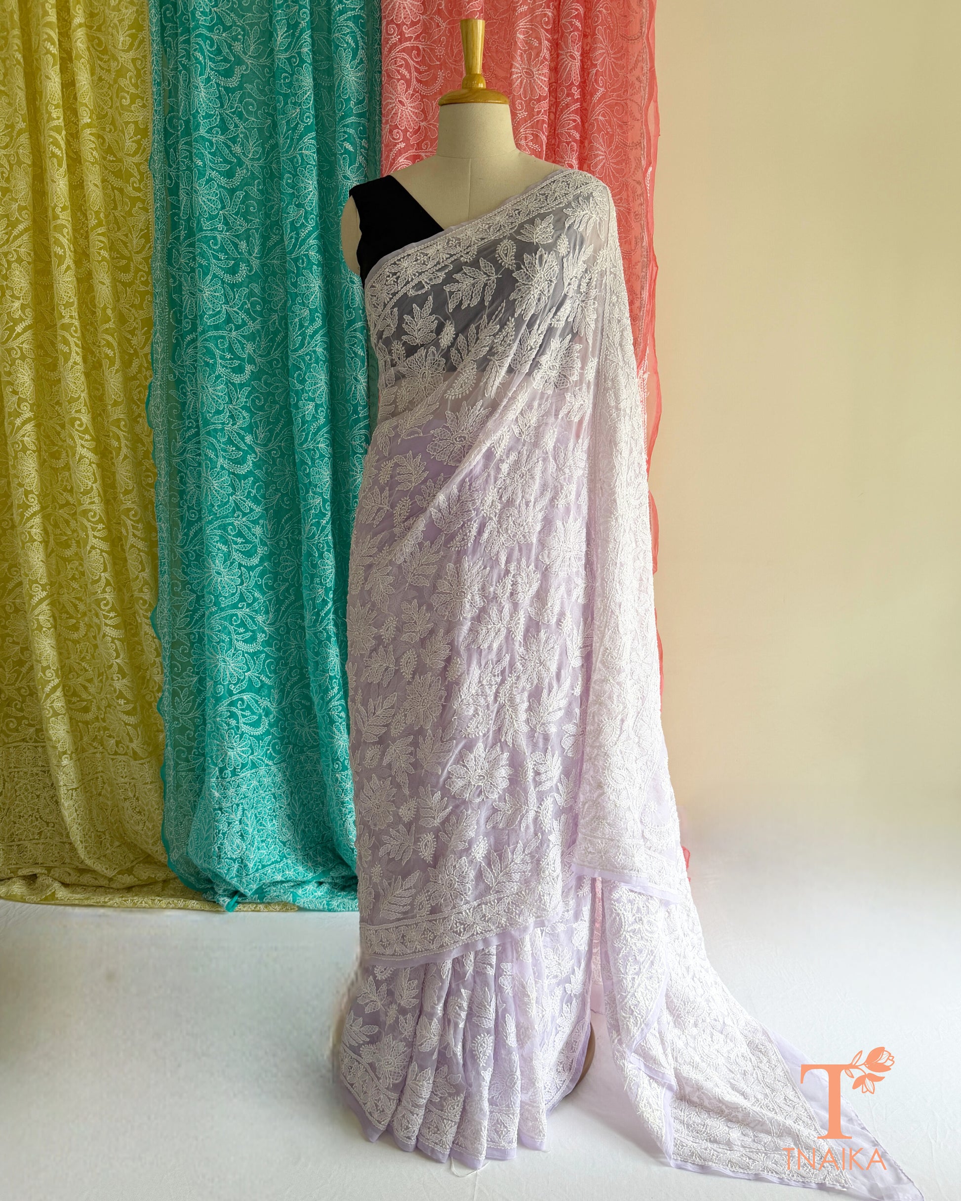 Premium Chikankari saree showcasing traditional embroidery and refined craftsmanship.