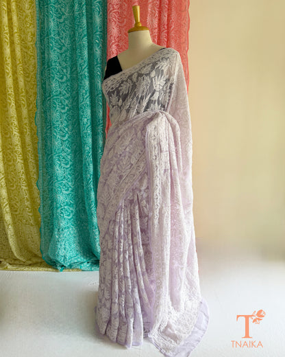 Premium Chikankari full jaal saree featuring dense traditional embroidery.