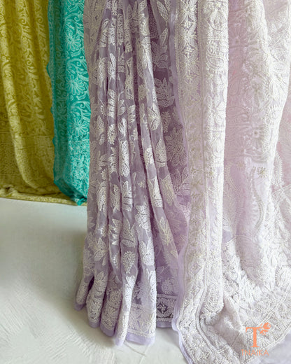Lightweight full jaal Chikankari saree with intricate floral embroidery.