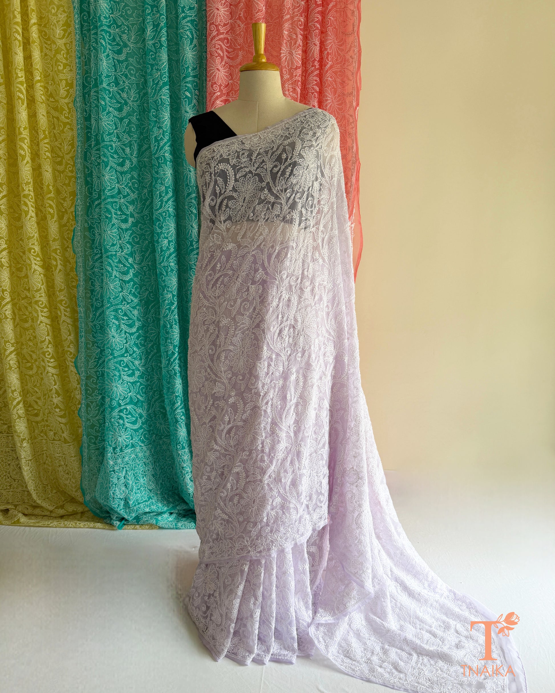 Handcrafted full jaal Lucknowi Chikankari saree for festive and ethnic wear.