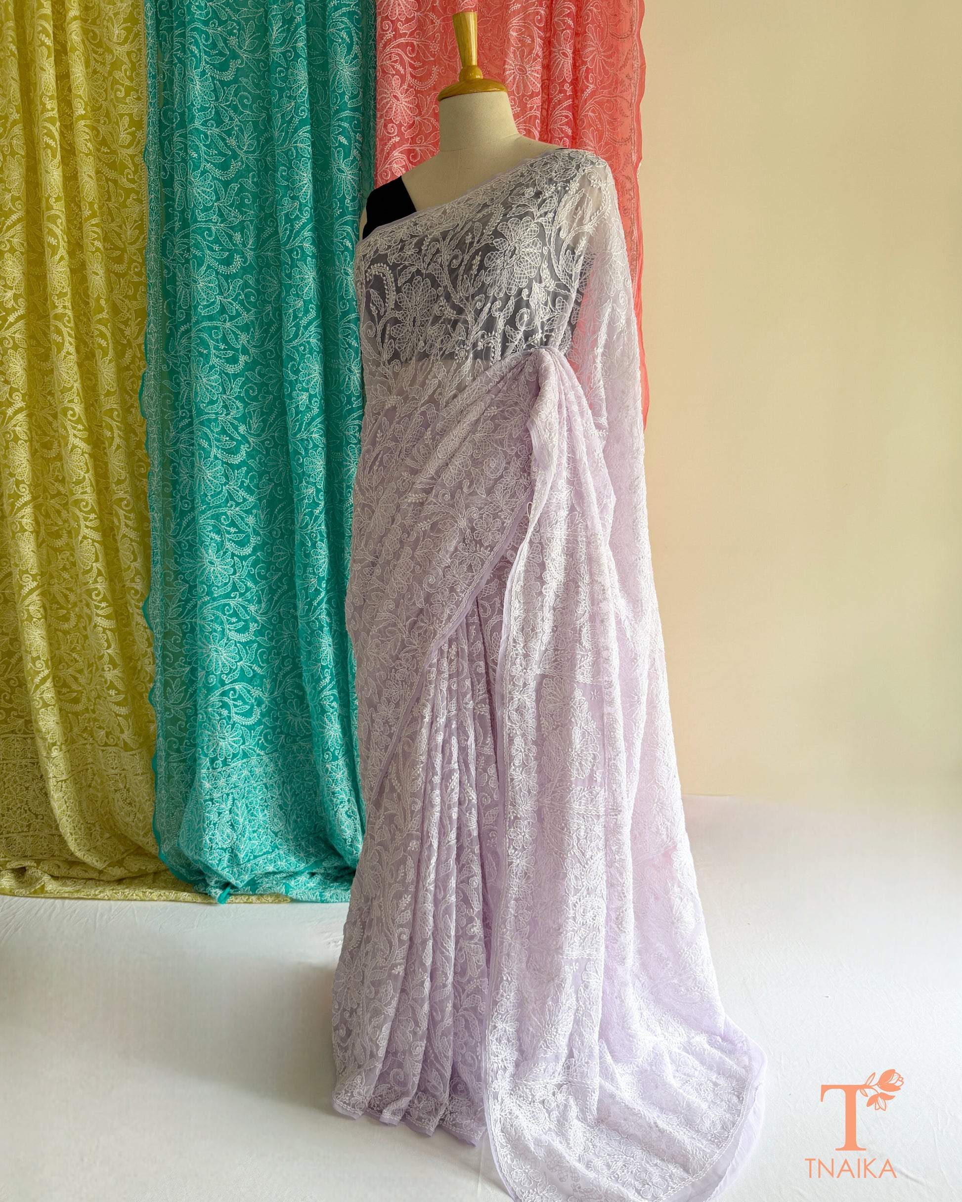 Premium Chikankari full jaal saree featuring dense traditional embroidery.