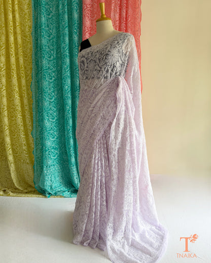 Premium Chikankari full jaal saree featuring dense traditional embroidery.