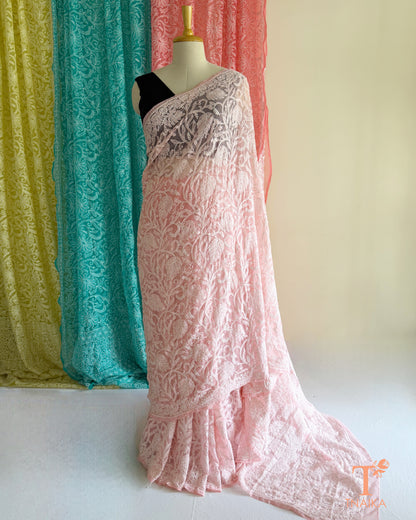 Soft Chikankari embroidered saree with timeless handcrafted detailing.
