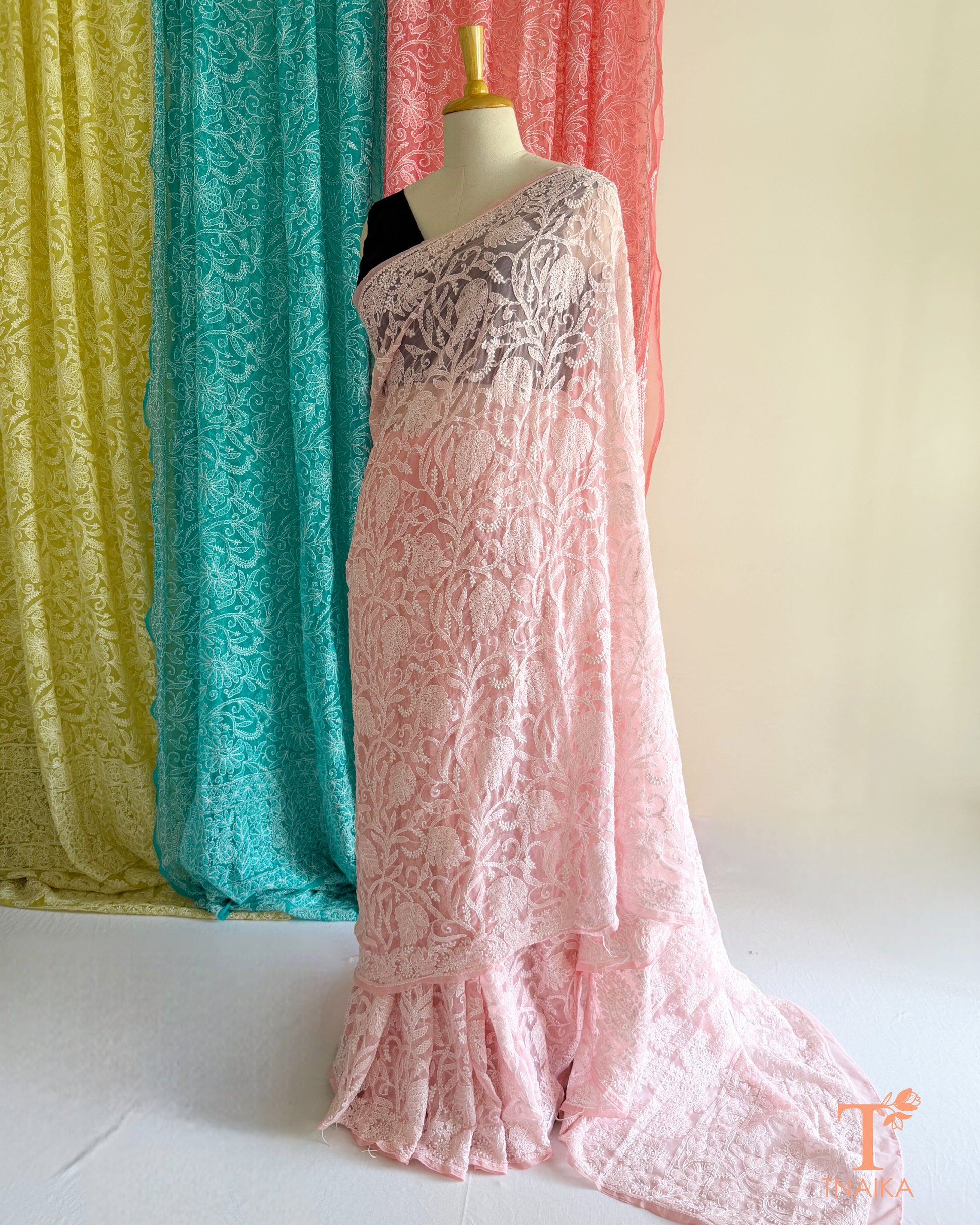 Full jaal Chikankari saree with intricate Lucknowi embroidery on soft fabric.