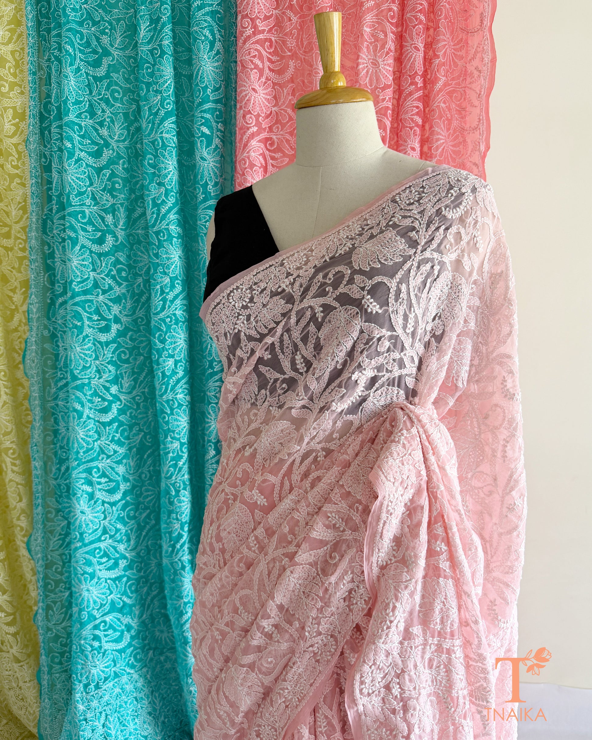 Premium Chikankari full jaal saree featuring dense traditional embroidery.