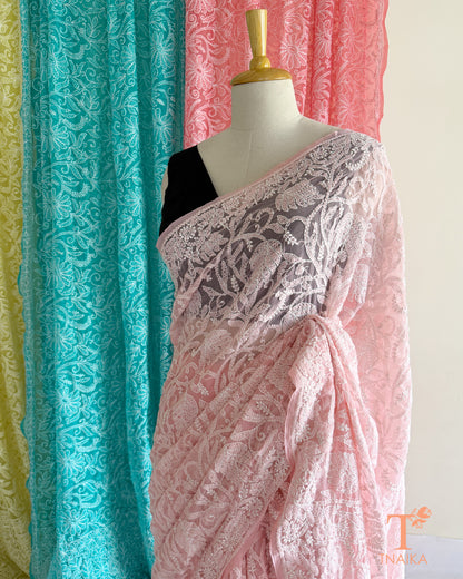 Premium Chikankari full jaal saree featuring dense traditional embroidery.