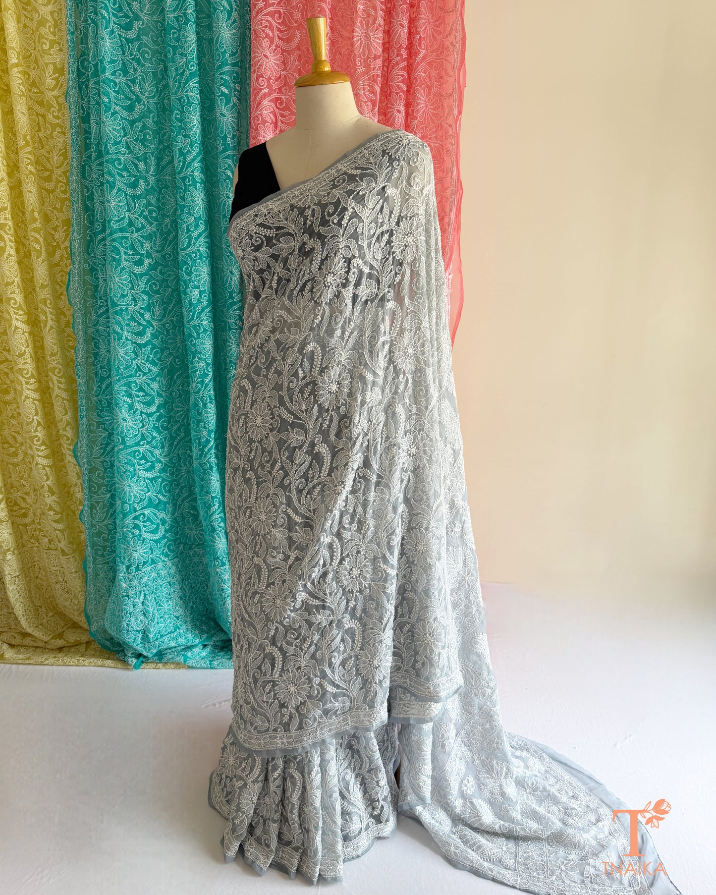 Lightweight full jaal Chikankari saree with intricate floral embroidery.