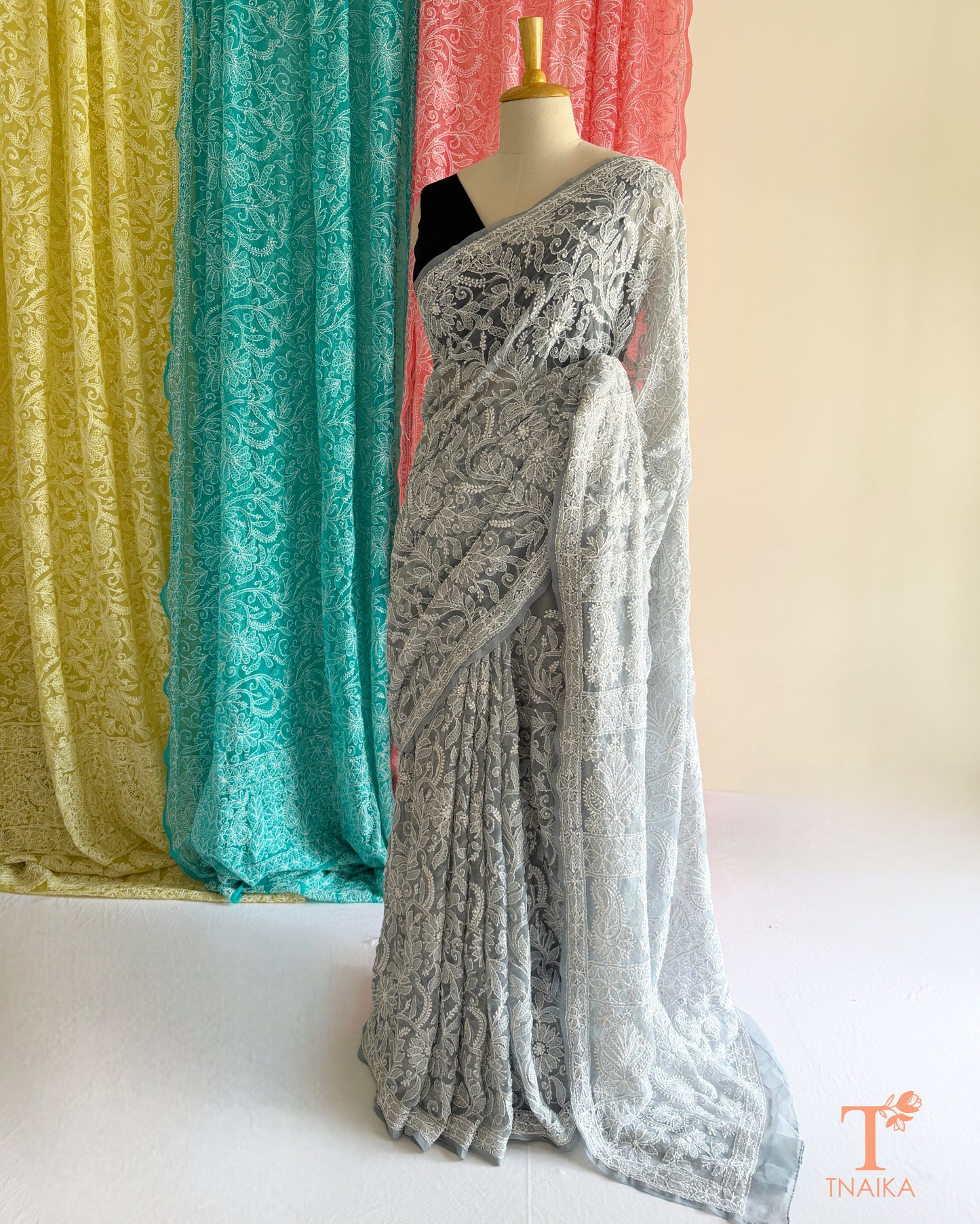 Premium Chikankari full jaal saree featuring dense traditional embroidery.