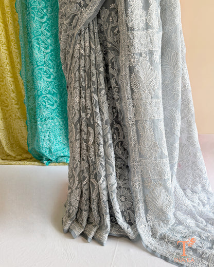 Handcrafted full jaal Lucknowi Chikankari saree for festive and ethnic wear.