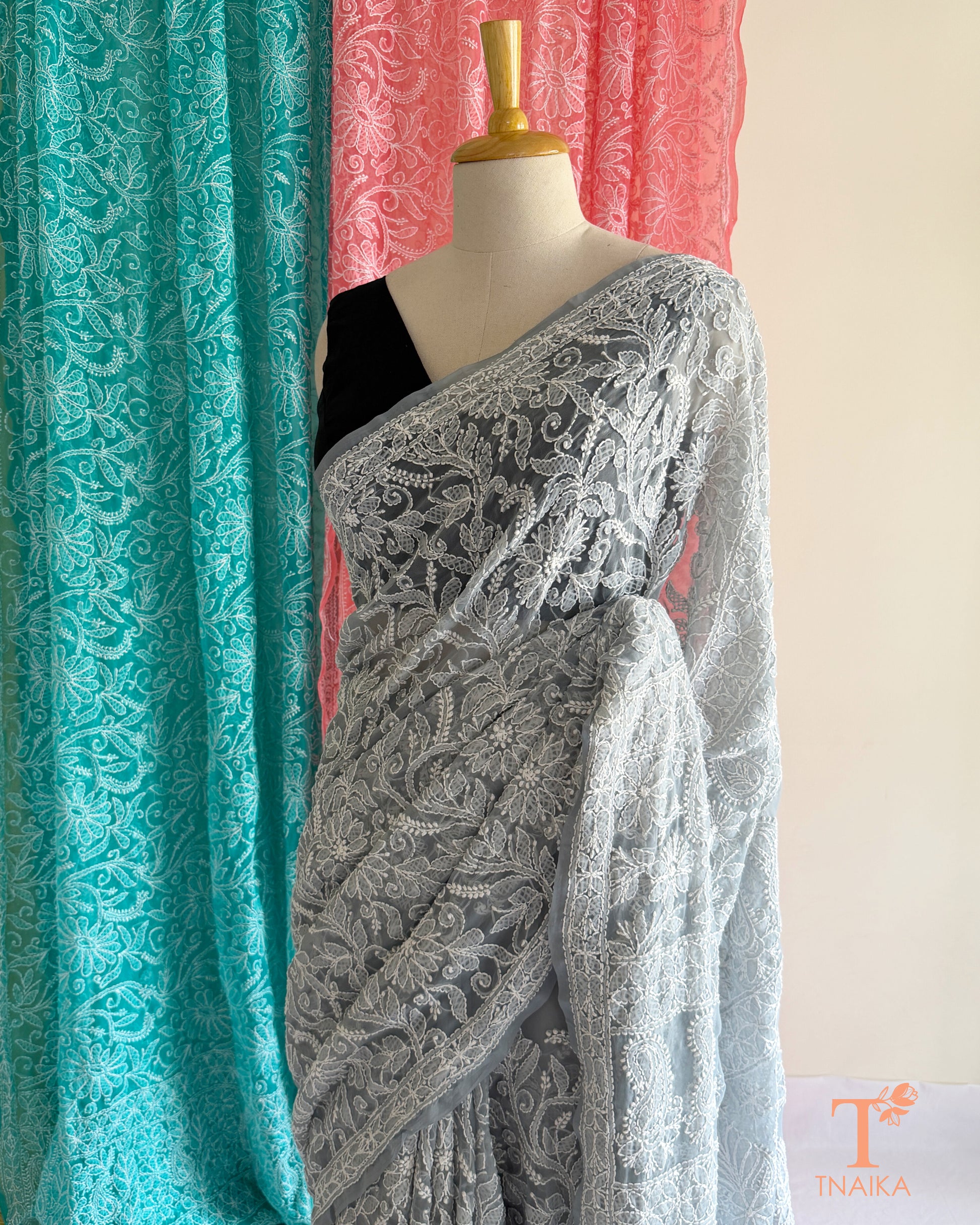 Soft Chikankari embroidered saree with timeless handcrafted detailing.
