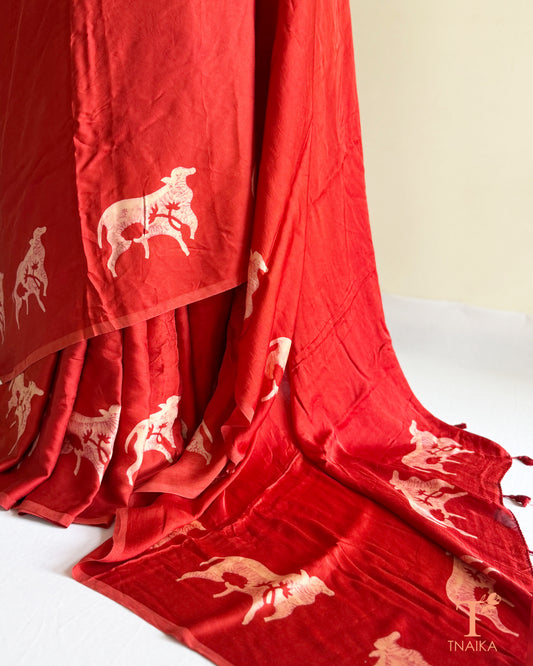 Hand-dyed modal silk saree featuring handcrafted cow motifs