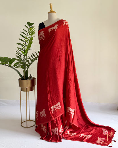 Hand-dyed modal saree showcasing unique cow motif detailing