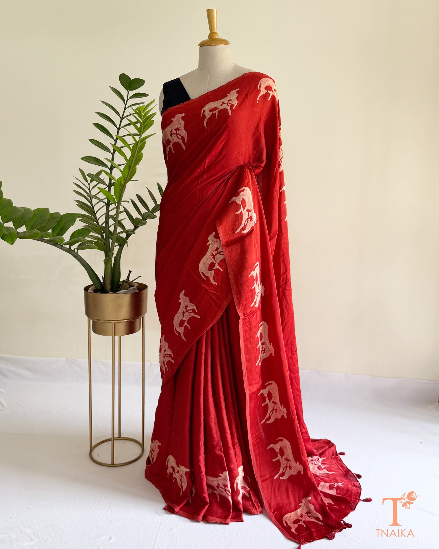 Handcrafted modal saree hand-dyed with traditional cow motifs