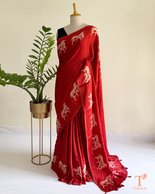 Handcrafted modal saree hand-dyed with traditional cow motifs