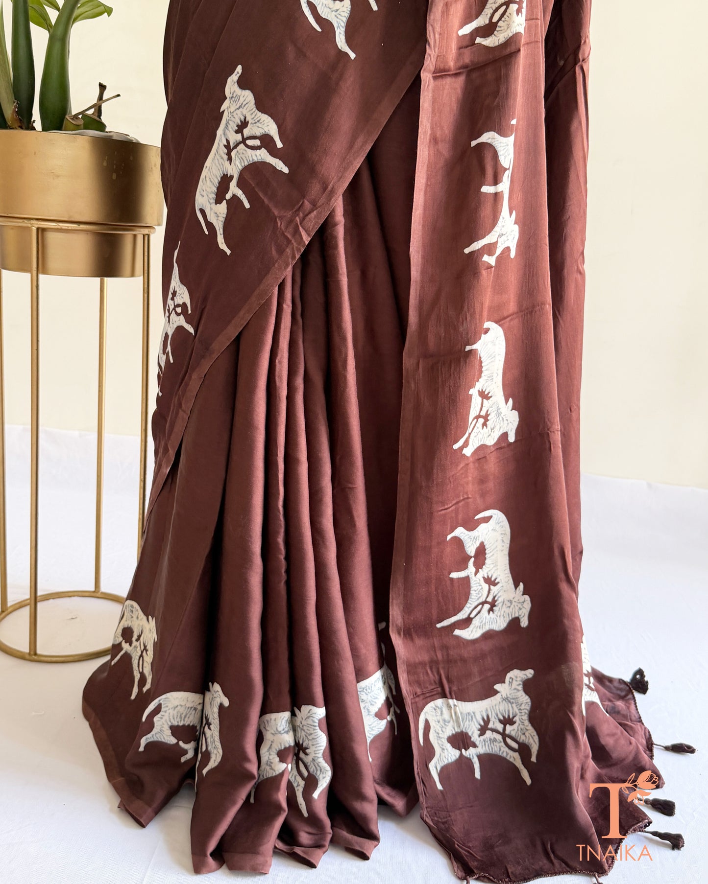 Handcrafted modal saree hand-dyed with traditional cow motifs