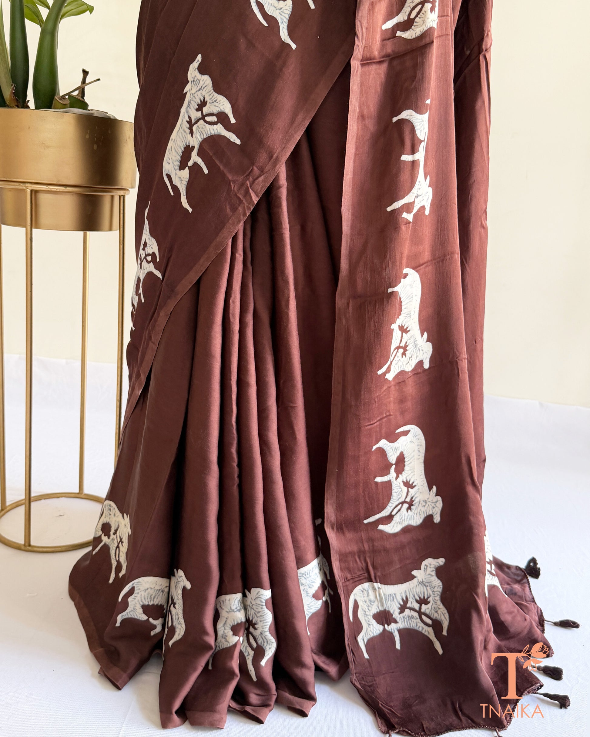Handcrafted modal saree hand-dyed with traditional cow motifs