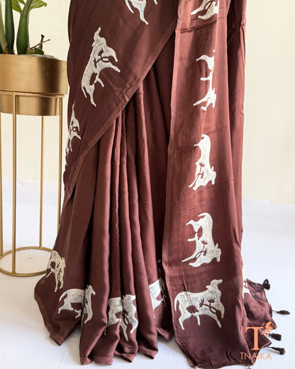 Handcrafted modal saree hand-dyed with traditional cow motifs