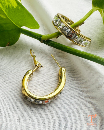Elegant gold hoop earrings with clear crystal detailing