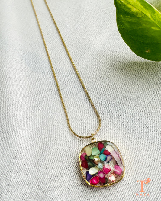 Anti tarnish necklace with colorful resin pendant and delicate chain.