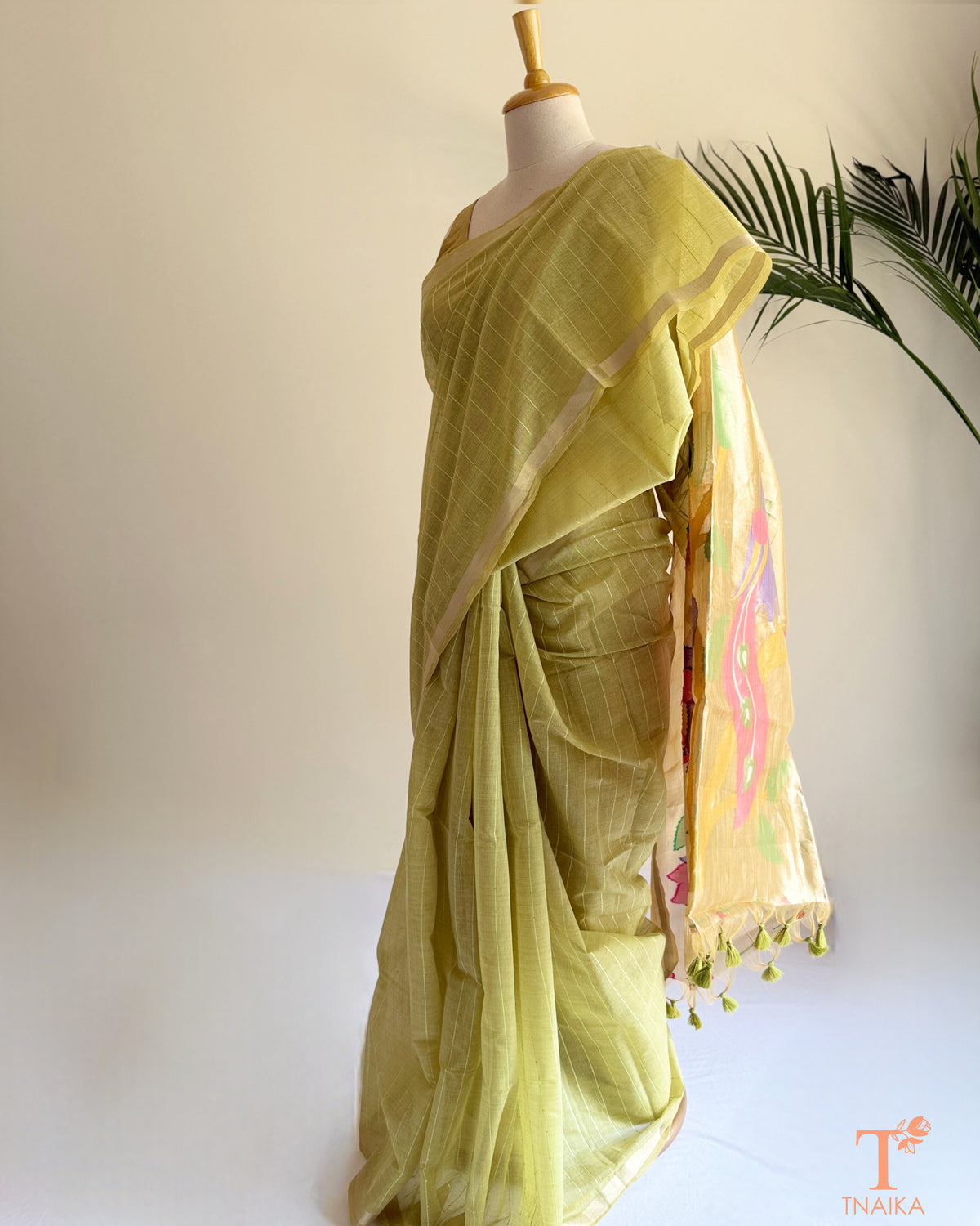 Paithani-inspired saree with fine sequin detailing and tassel pallu