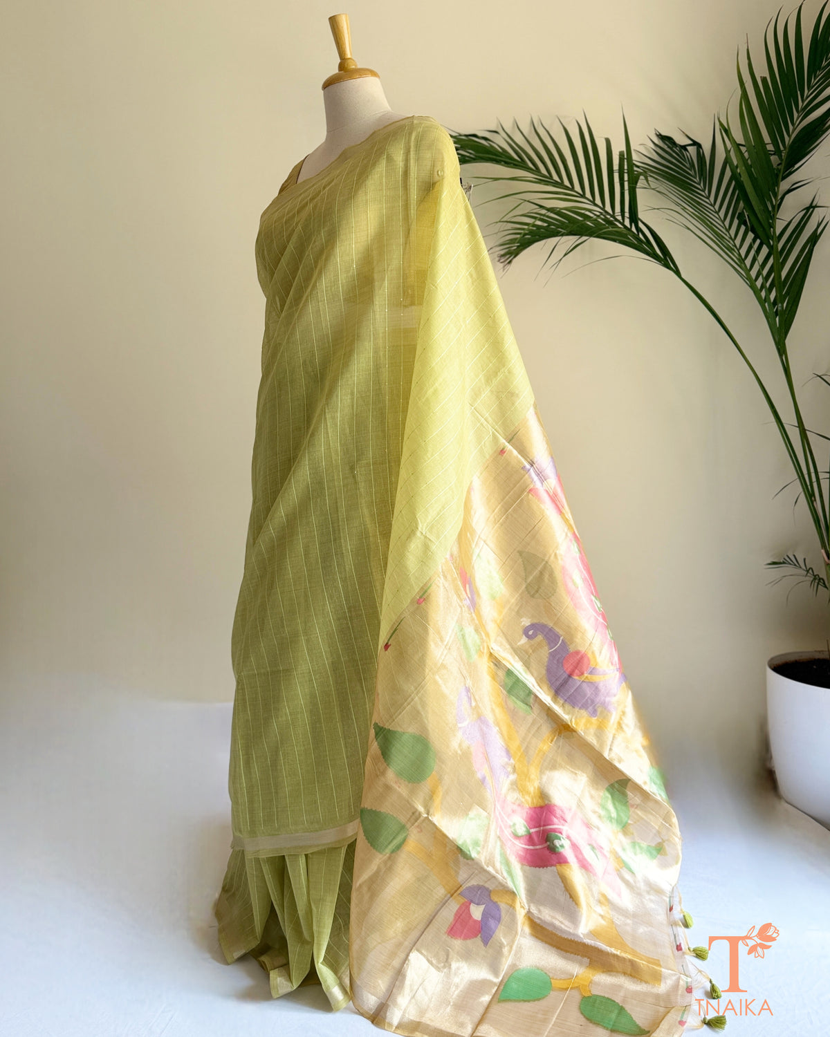 Paithani-inspired lime green cotton saree with colourful pallu and fine sequin detailing