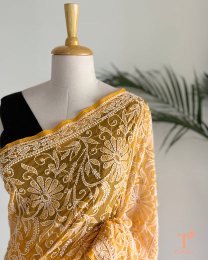 Handcrafted Lucknowi Chikankari saree in mustard yellow georgette.