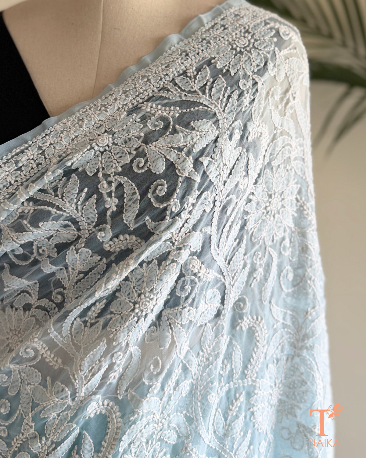Lightweight full jaal Chikankari saree with intricate floral embroidery.