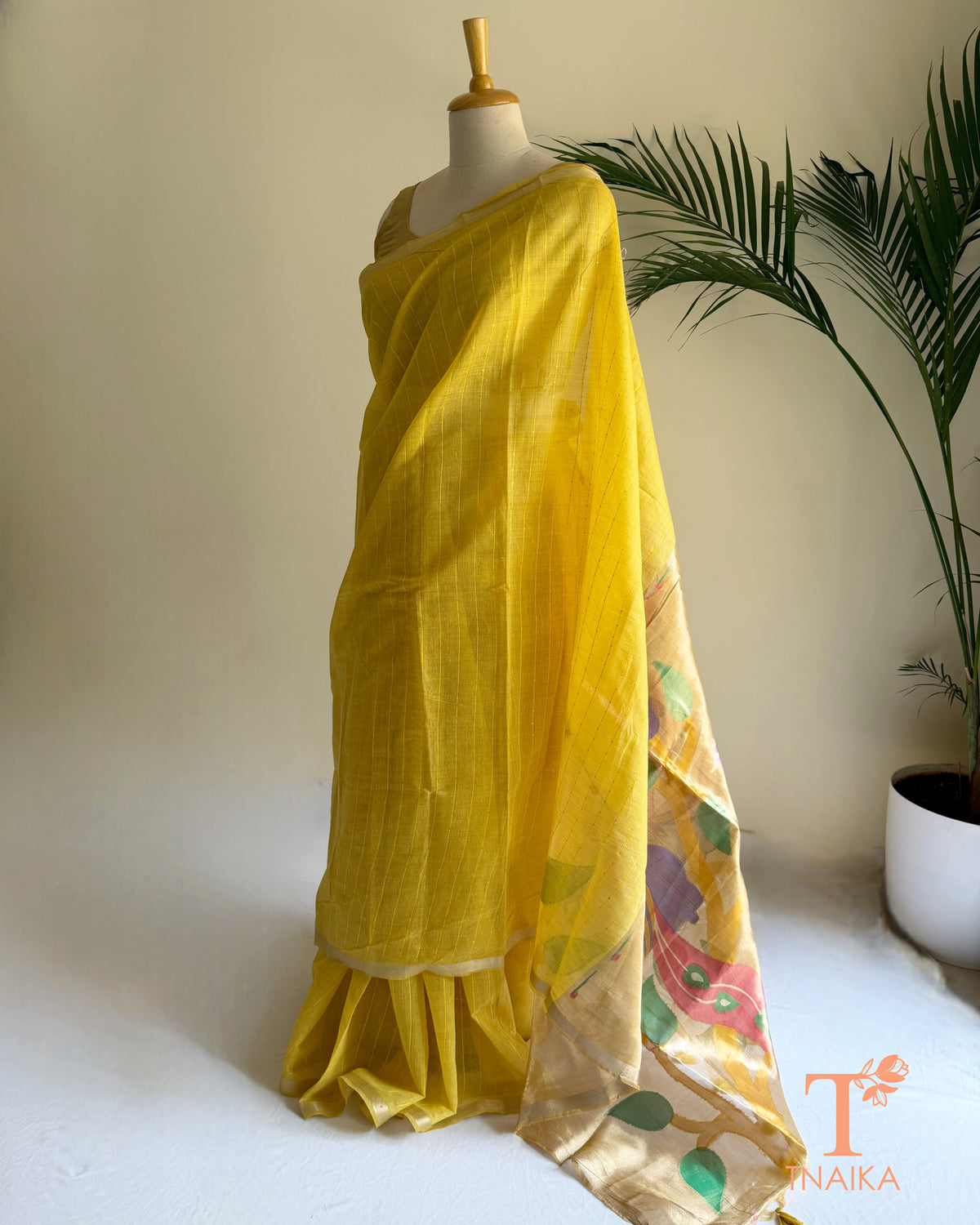 Yellow cotton saree with colourful traditional-inspired pallu