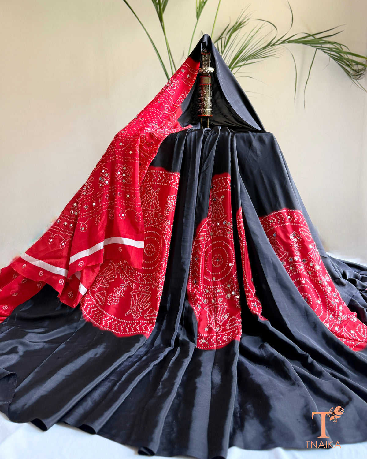 Satin silk saree featuring traditional inspired print and mirrors