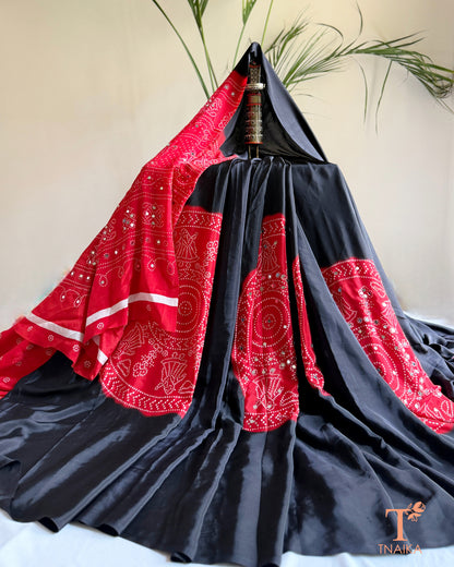 Satin silk saree featuring traditional inspired print and mirrors