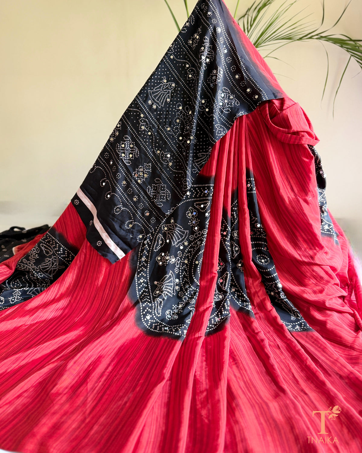 Traditional inspired satin silk saree with printed motifs and mirrors