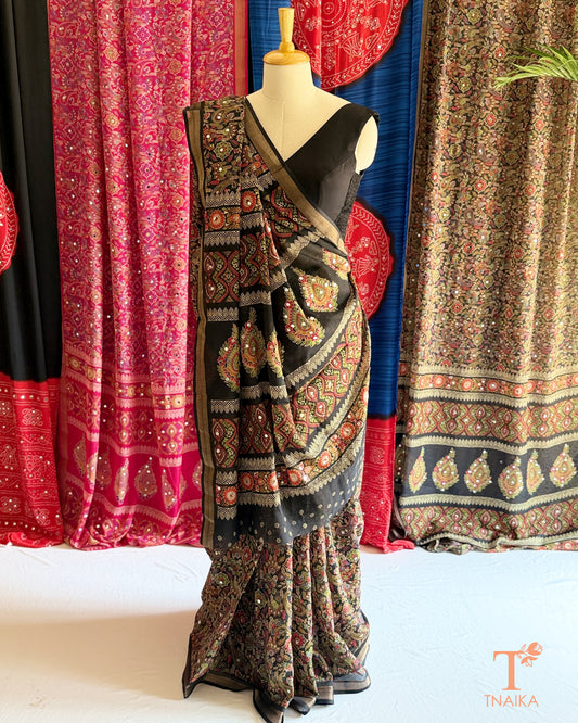 Elegant Marshmallow saree with mirror embellishments for celebrations
