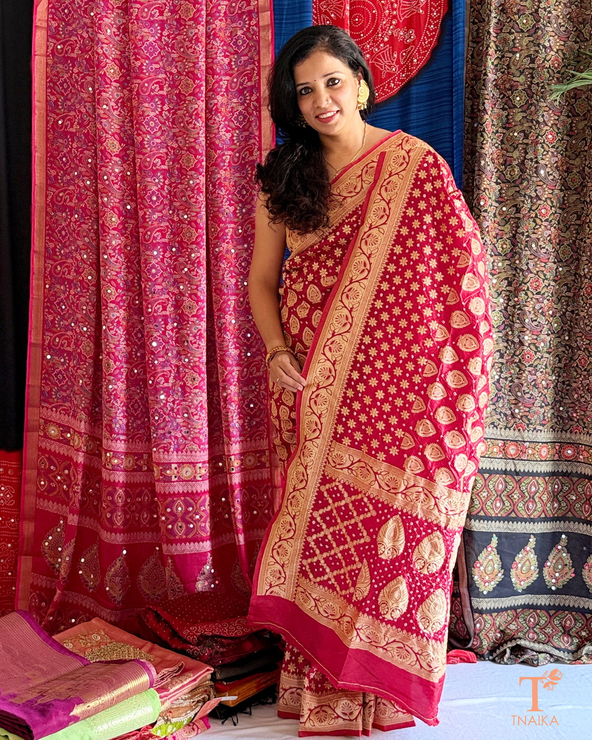 Upada silk saree featuring Bandhani print and intricate zari border