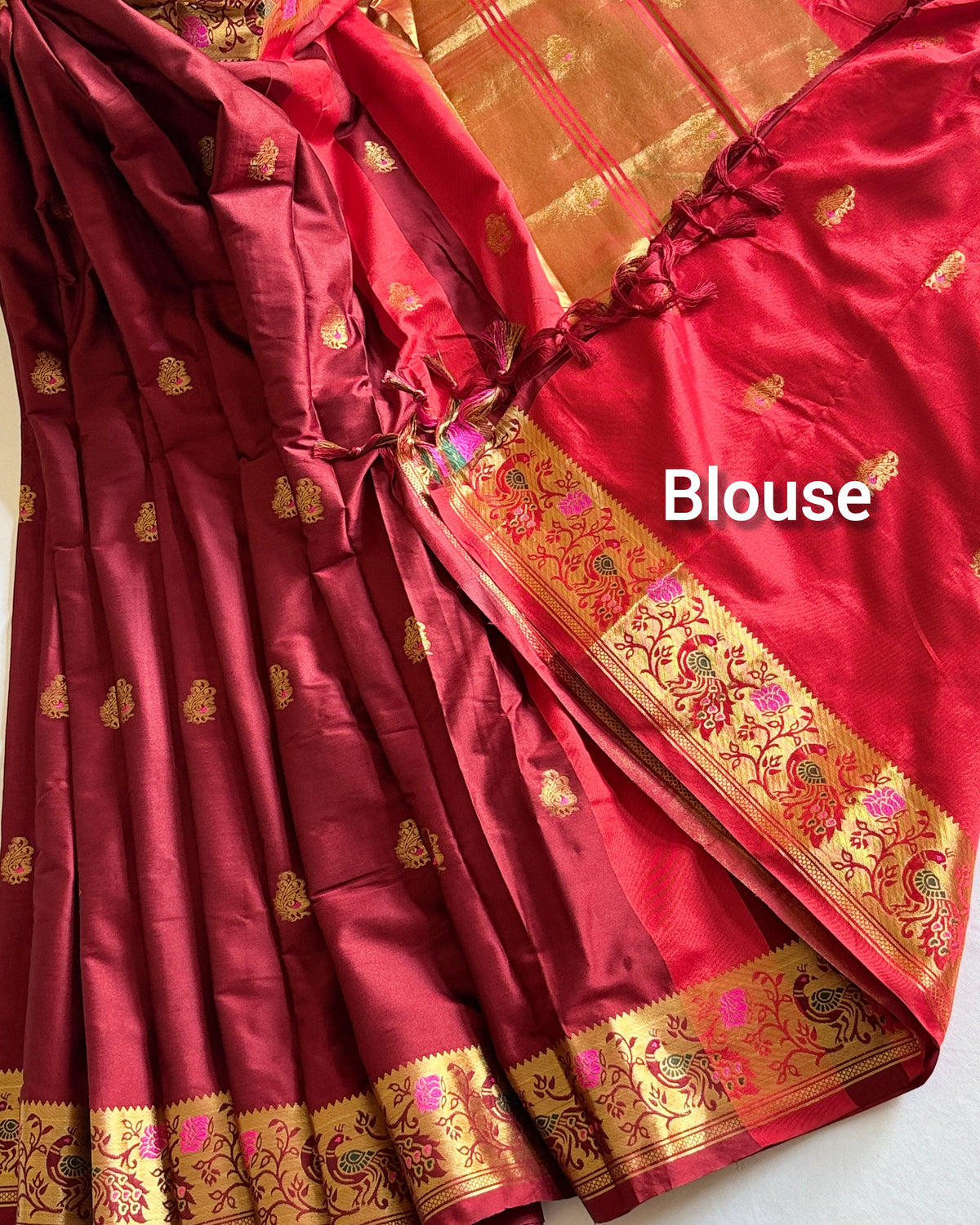 Semi silk saree with decorative floral and peacock-inspired pallu
