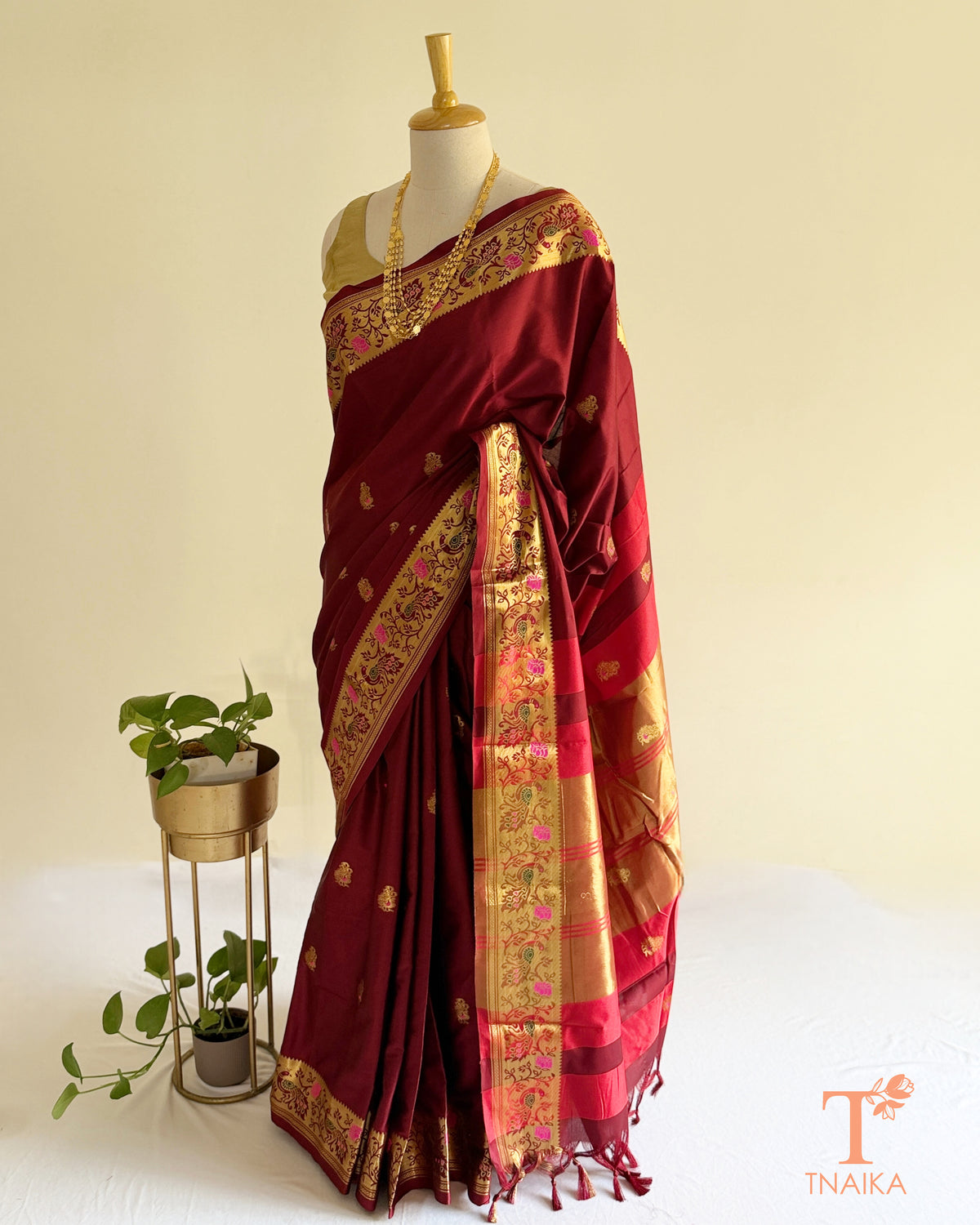 Semi silk saree featuring decorative Paithani-style pallu