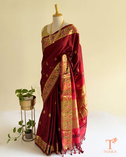 Semi silk saree featuring decorative Paithani-style pallu
